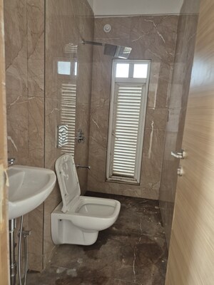Bathroom in 2 BHK Apartment at Ruparel Iris, Matunga West – for Sale