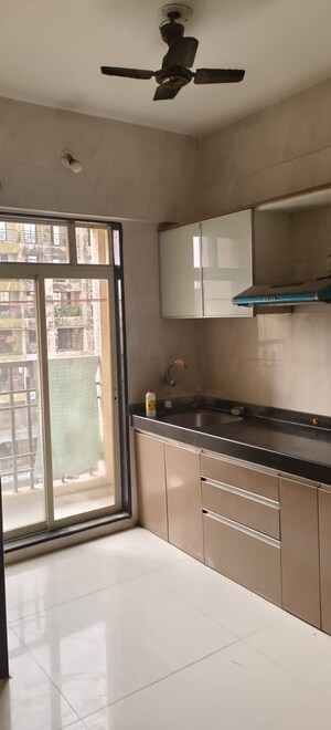 Kitchen in 2 BHK Apartment at Agarwal Paramount, Virar West – for Sale