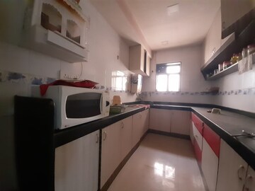 Kitchen in 3 BHK Apartment at Moroccan Cooperative Housing Society, Goregaon East – for Sale