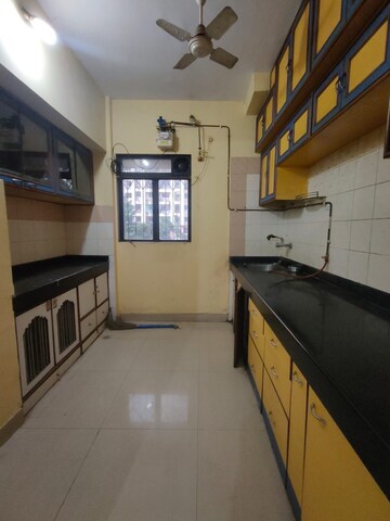 Kitchen in 1 BHK Apartment at Happy Valley, Manpada – for Rent