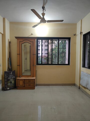 Living Room in 1 BHK Apartment at Happy Valley, Manpada – for Rent