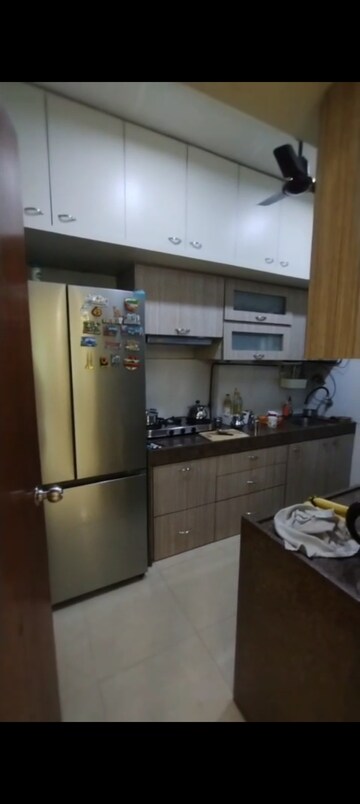 Kitchen in 3 BHK Apartment at RNA Heights, Andheri East – for Rent