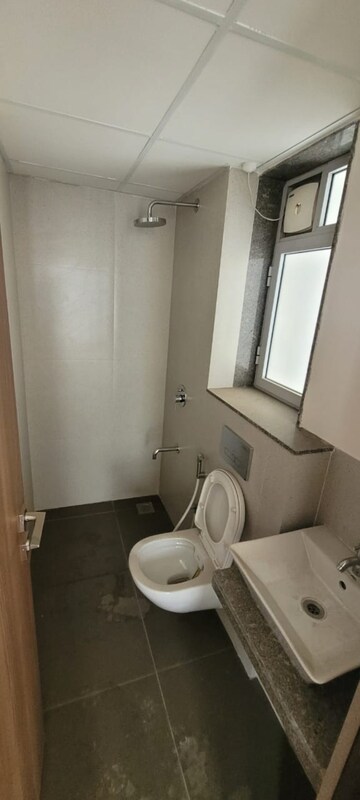 Bathroom in 2 BHK Apartment at Piramal Vaikunth, Balkum Pada – for Rent