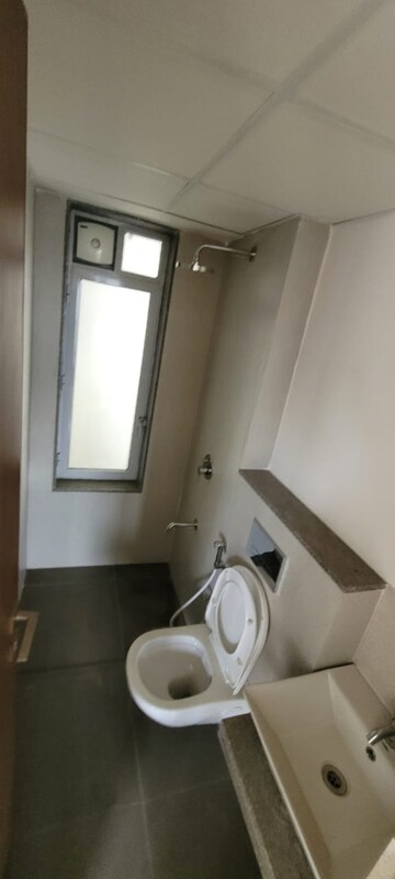 Bathroom in 2 BHK Apartment at Piramal Vaikunth, Balkum Pada – for Rent