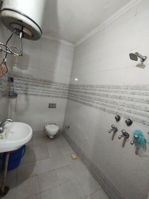 Bathroom in 3 BHK Apartment at Guru Nanak Enclave, Dhakoli – for Sale