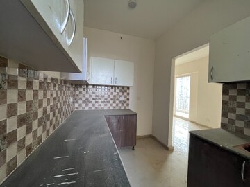 Kitchen in 3 BHK Apartment at Mahagun Mantra I, Sector 10 Greater Noida – for Rent