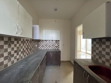 Kitchen in 3 BHK Apartment at Mahagun Mantra I, Sector 10 Greater Noida – for Rent