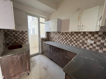 Kitchen in 3 BHK Apartment at Mahagun Mantra I, Sector 10 Greater Noida – for Rent