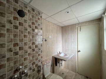 Bathroom in 3 BHK Apartment at Mahagun Mantra I, Sector 10 Greater Noida – for Rent