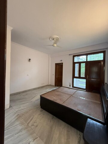 Bedroom in 3 BHK Builder Floor at Nehru Enclave – for Rent