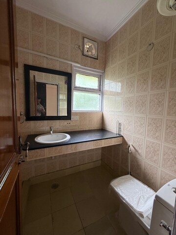 Bathroom in 3 BHK Builder Floor at Nehru Enclave – for Rent