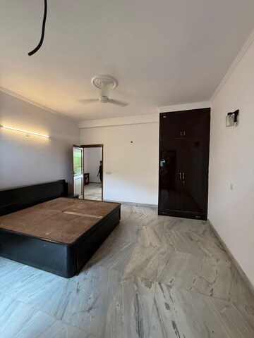 Bedroom in 3 BHK Builder Floor at Nehru Enclave – for Rent