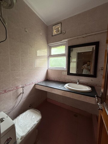 Bathroom in 3 BHK Builder Floor at Nehru Enclave – for Rent