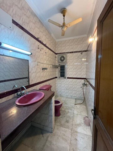 Bathroom in 3 BHK Builder Floor at Kalkaji – for Rent