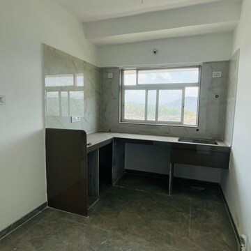 Kitchen in 1 BHK Apartment at Shraddha Evoque, Sonapur – for Sale