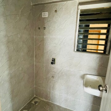 Bathroom in 1 BHK Apartment at Shraddha Evoque, Sonapur – for Sale