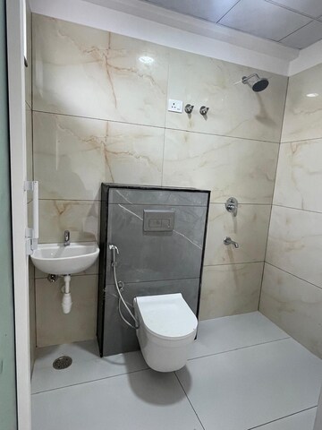 Bathroom in 4 BHK Apartment at Mansarovar Extension – for Rent