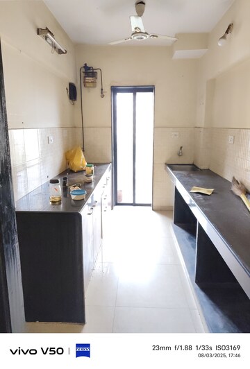 Kitchen in 2 BHK Apartment at Lalani Residency, Kavesar – for Rent