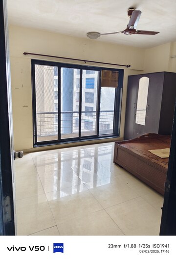 Room in 2 BHK Apartment at Lalani Residency, Kavesar – for Rent