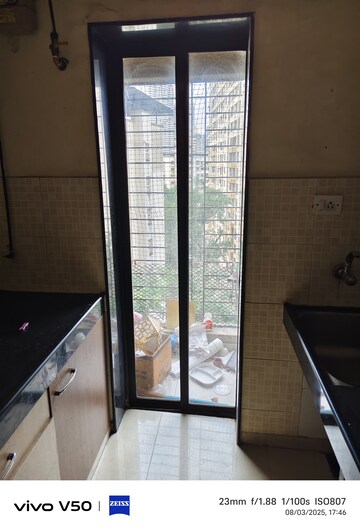 Kitchen in 2 BHK Apartment at Lalani Residency, Kavesar – for Rent