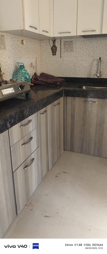 Kitchen in 1 BHK Apartment at Solitaire Heights, Malad West – for Rent