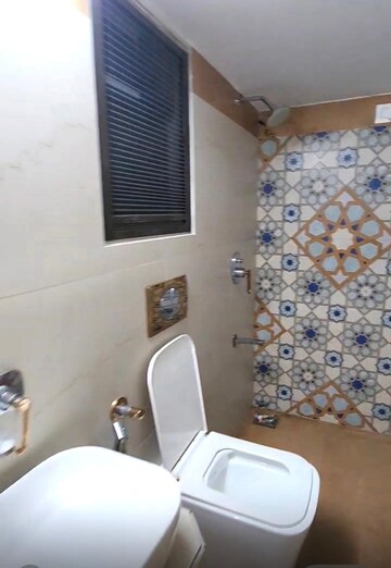 Bathroom in 2 BHK Apartment at Rassaz Greens Tower C D and E, Mira Road – for Rent
