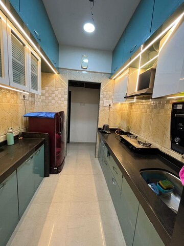 Kitchen in 2 BHK Apartment at Tharwani Meghna Montana, Ambernath West – for Rent