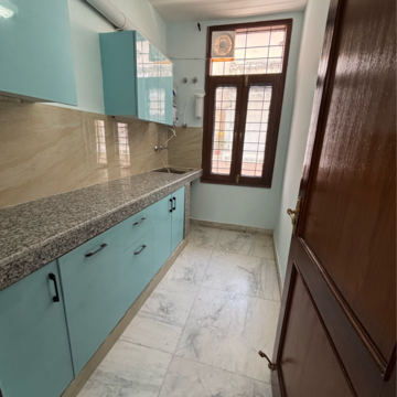 Kitchen in 2 BHK Builder Floor at Ansal Plaza Sector-23, Carterpuri Village – for Rent
