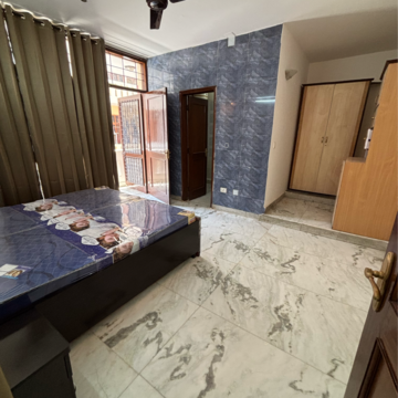 Bedroom in 2 BHK Builder Floor at Ansal Plaza Sector-23, Carterpuri Village – for Rent