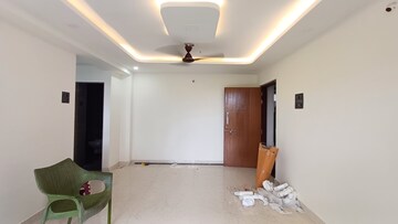 Living Room in 2 BHK Apartment at Rambaug CHS Andheri East, Andheri East – for Rent
