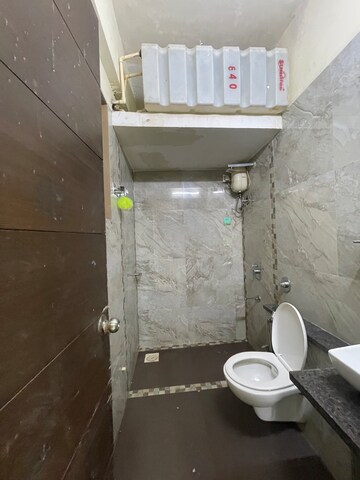 Bathroom in 4 BHK Apartment at Rashmi Signature, Mira Road – for Rent