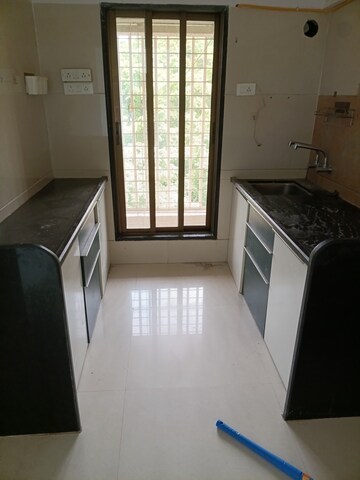 Kitchen in 2 BHK Apartment at Unique Greens Ghodbunder Road, Ghodbunder Road – for Rent