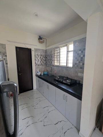 Kitchen in 2 BHK Apartment at Vijaylaxmi River Residency, Chikhali – for Rent