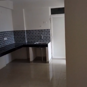 Kitchen in 3 BHK Apartment at Nilaya Greens, Sikrod – for Sale