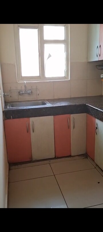 Kitchen in 2 BHK Apartment at Panchsheel Greens, Sector 16 Greater Noida – for Rent