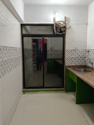 Kitchen in 2 BHK Apartment at SR Good Luck Heights, Taloja – for Rent