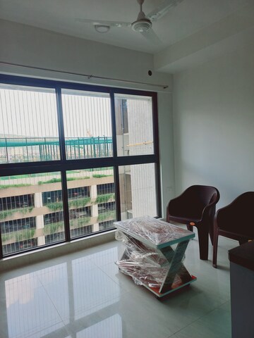 Living Room in 1 BHK Apartment at Lodha Crown Quality Homes, Majiwada – for Rent