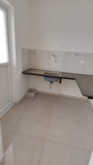 Kitchen in 2 BHK Apartment at Provident Neora, Thanisandra Main Road – for Rent