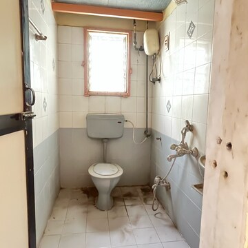 Bathroom in 2 BHK Apartment at New Brahmand Phase 7 CHS, Kiran Mill Colony – for Sale