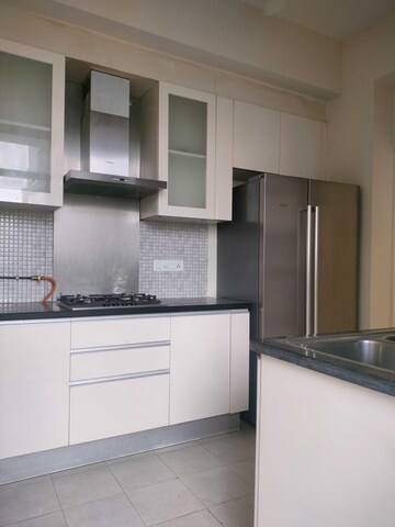 Kitchen in 4 BHK Apartment at DLF Ultima Phase II, Sector 81 – for Sale