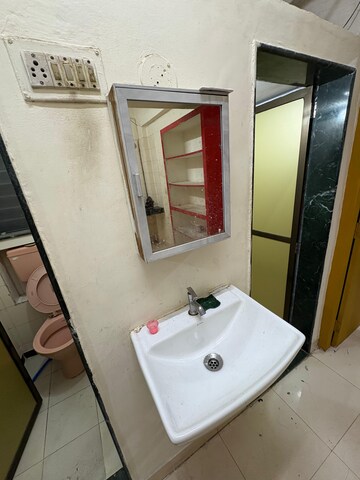 Bathroom in 1 BHK Apartment at Omkar The Residences, Chembur – for Rent