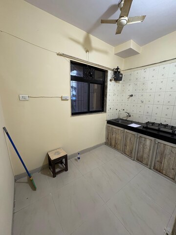 Living Room in 1 BHK Apartment at Tara Gagan CHS, Tilak Nagar – for Rent