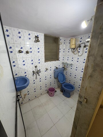 Bathroom in 1 BHK Apartment at Tara Gagan CHS, Tilak Nagar – for Rent