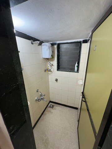 Kitchen in 1 BHK Apartment at Tara Gagan CHS, Tilak Nagar – for Rent
