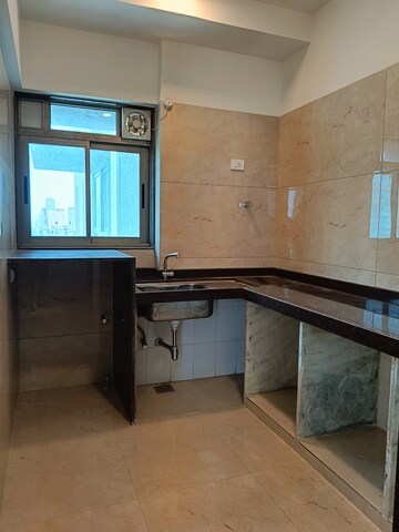 Kitchen in 2 BHK Apartment at Chandak Cornerstone, Worli – for Rent