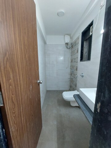 Bathroom in 2 BHK Apartment at Vile Parle East – for Rent