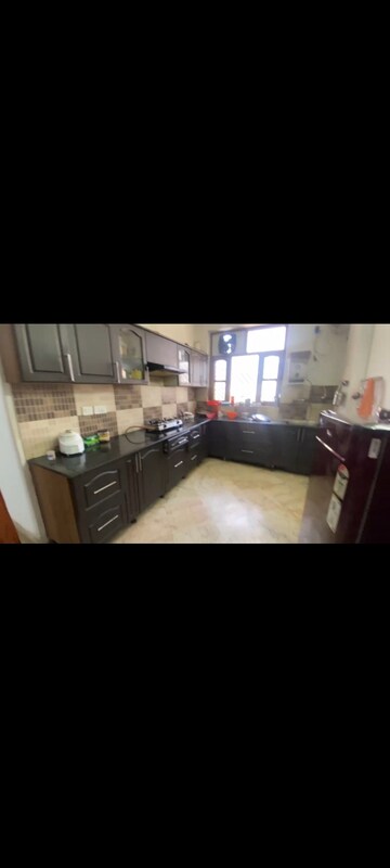 Kitchen in 2 BHK Apartment at Aman Luxury Apartments, Sahastradhara Road – for Rent