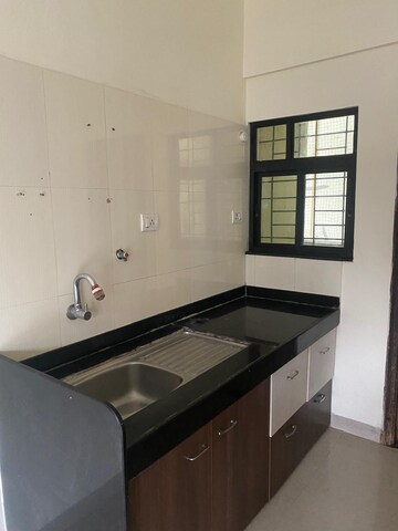 Kitchen in 3 BHK Apartment at Atul Alcove, Pimple Saudagar – for Rent