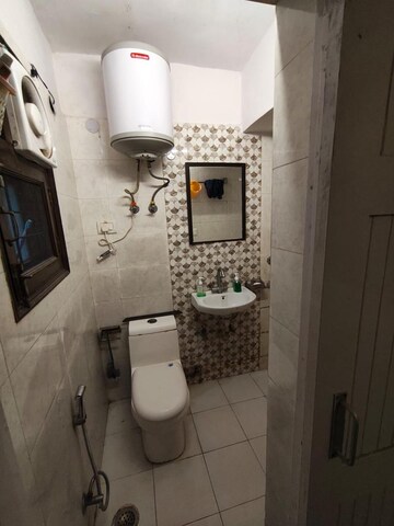 Bathroom in 3 BHK Builder Floor at Kalkaji – for Rent