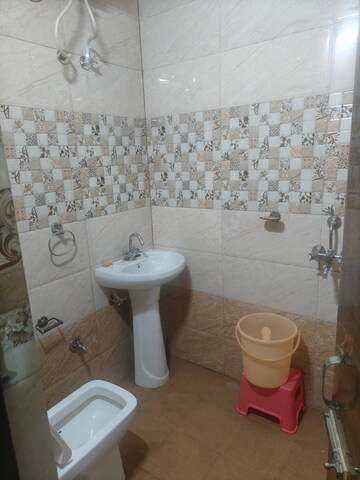 Bathroom in 3 BHK Builder Floor at Dhakoli – for Rent